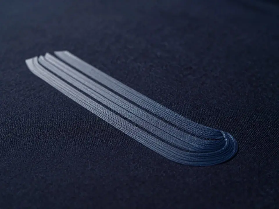 Layered ink build showing stepped relief height