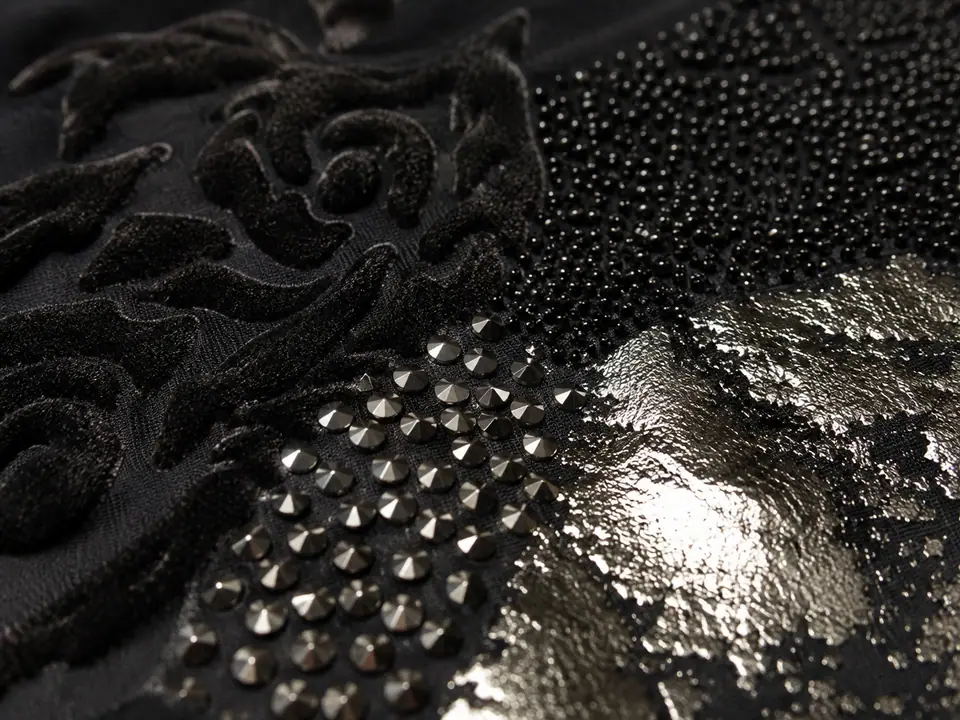 Mixed embellishment on one panel - velvet flock, caviar beads, metal studs and foil
