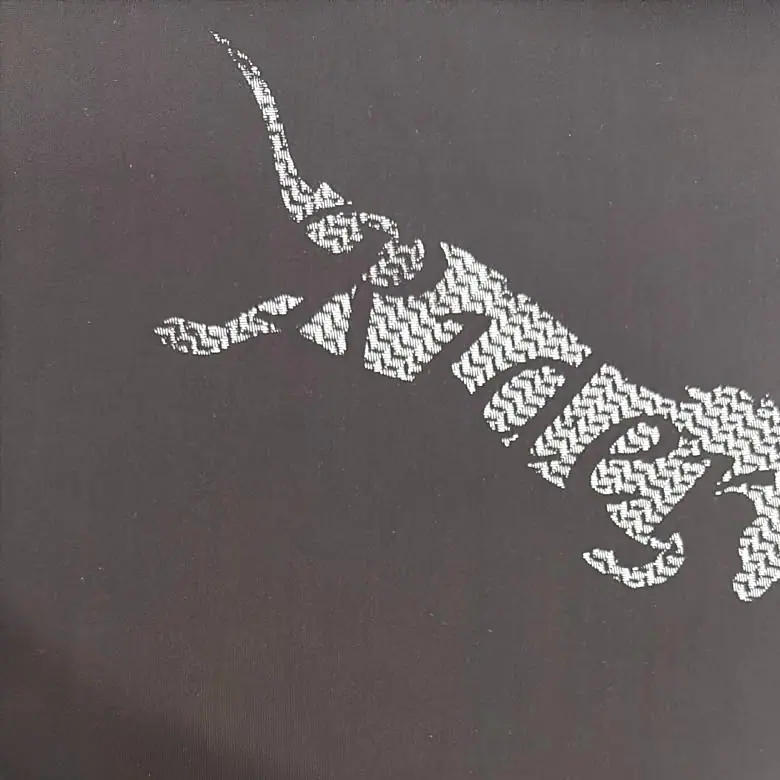 Fine silicone printing with dotted motif on dark stretch fabric